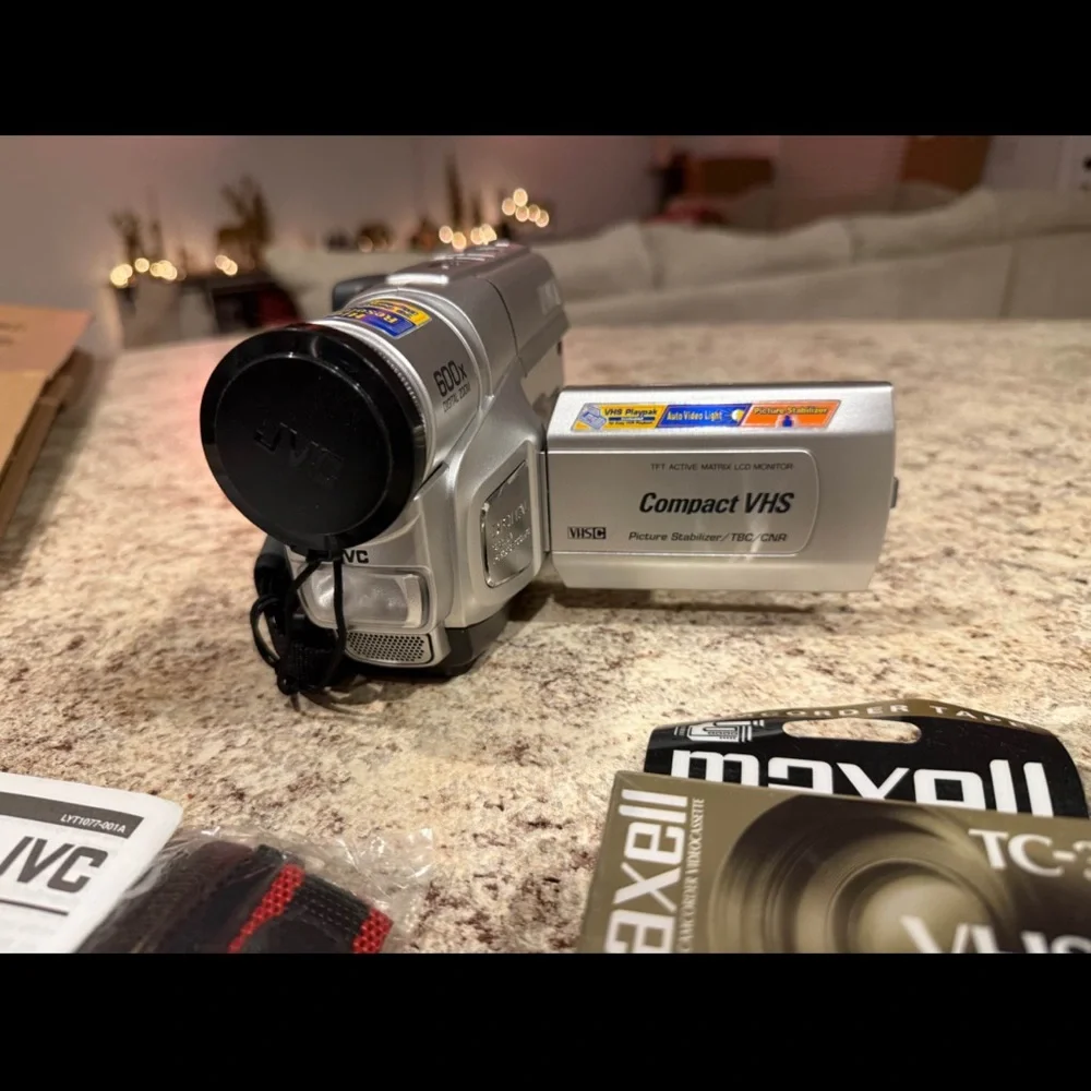 JVC Gray Camcorder with VHS-C Tapes
